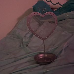 This is a really nice earring holder that needs a brand new owner